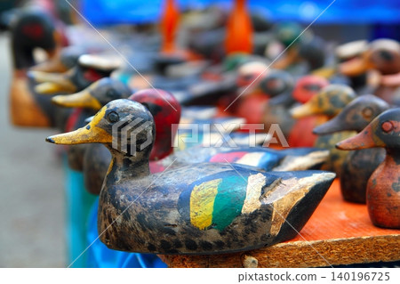 Duck decoy arrangement colorful row 140196725
