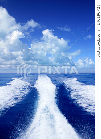 Boat wake prop wash on blue ocean sea Boat wake prop wash on blue ocean sea 140196729