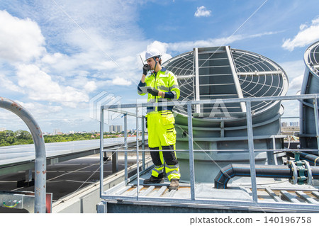 Professional Worker Servicing HVAC building cooling tower, Industry air conditioner service Professional Worker Servicing HVAC building cooling tower, Industry air conditioner service 140196758