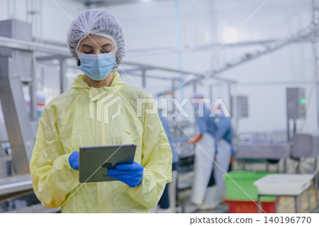 Food hygiene officer inspecting and certifying the cleanliness of fish production product factory, Food hygiene officer inspecting and certifying the cleanliness of fish production product factory, 140196770