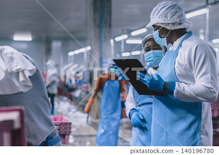 Food hygiene officer inspecting and certifying the cleanliness of fish production product factory, Food hygiene officer inspecting and certifying the cleanliness of fish production product factory, 140196780