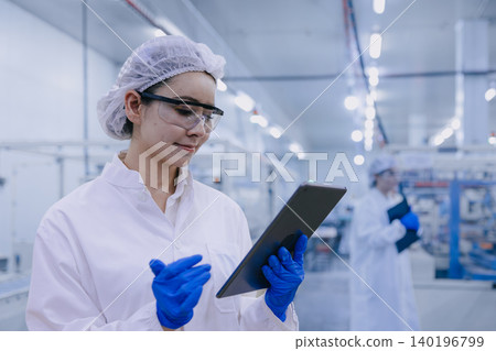 Hygiene inspector stuff officer work in science factory. Pharmaceutical medicine production process. Hygiene inspector stuff officer work in science factory. Pharmaceutical medicine production process. 140196799