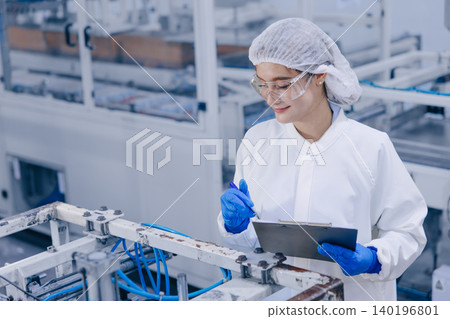 Hygiene inspector stuff officer work in science factory. Pharmaceutical medicine production process. 140196801