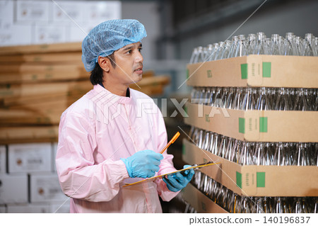 Glass bottle and food packaging manufacturing plant worker working in Warehouse Product storage area Glass bottle and food packaging manufacturing plant worker working in Warehouse Product storage area 140196837