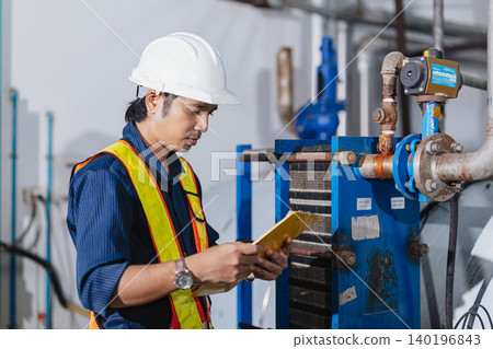 Industrial factory worker, Engineer working in plant factory, Check service plumbing pipe system. 140196843