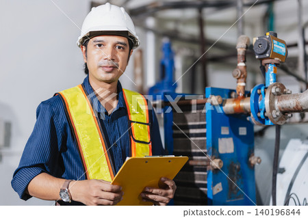 Industrial factory worker, Engineer working in plant factory, Check service plumbing pipe system. Industrial factory worker, Engineer working in plant factory, Check service plumbing pipe system. 140196844