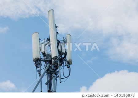 5g communication tower. 4g telecommunication tower. digital antenna cell site against blue sky 140196973