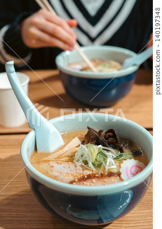 A warm and delicious Chinese noodle soup (ideal for lunch). A warm and delicious Chinese noodle soup (ideal for lunch). 140197348