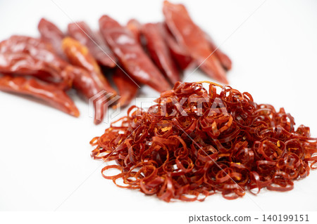 Sliced chili peppers Sliced chili peppers 140199151