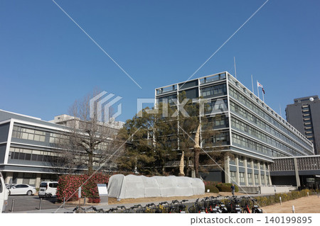 The Hiroshima Prefectural Assembly Hall, nestled in the government district and surrounded by trees with beautiful straight lines. The Hiroshima Prefectural Assembly Hall, nestled in the government district and surrounded by trees with beautiful straight lines. 140199895