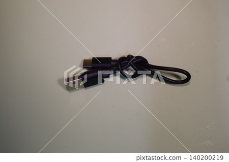 USB Cable on Light Surface 140200219
