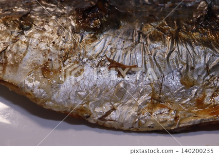Grilled Fish Skin Close-Up Grilled Fish Skin Close-Up 140200235