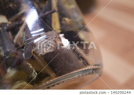 Glass Jar with Dried Spices Close-up Glass Jar with Dried Spices Close-up 140200244