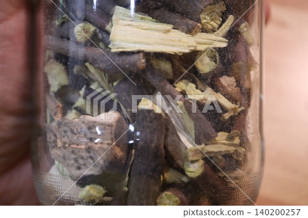 Dried Botanicals in Glass Jar Close-up Dried Botanicals in Glass Jar Close-up 140200257