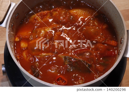 Simmering Korean Kimchi Stew in Pot 140200296
