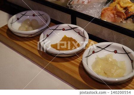 Japanese Restaurant Food Presentation with Small Bowls 140200554