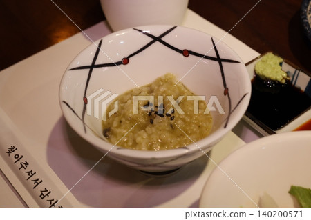 Rice Dish with Sesame Seeds in Decorative Bowl 140200571