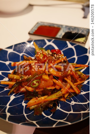 Spicy Vegetable Stir-Fry on Blue Plate Spicy Vegetable Stir-Fry on Blue Plate 140200578