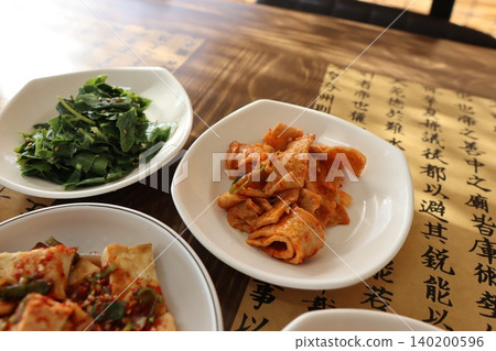 Korean Side Dishes on Wooden Table Korean Side Dishes on Wooden Table 140200596