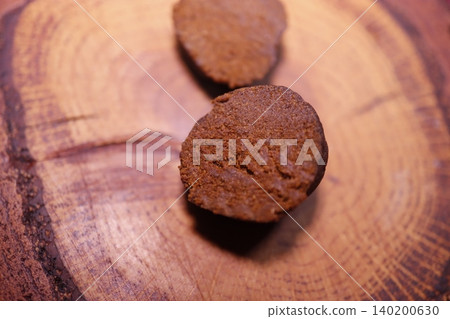 Rich Brown Muffins on Wooden Board Rich Brown Muffins on Wooden Board 140200630