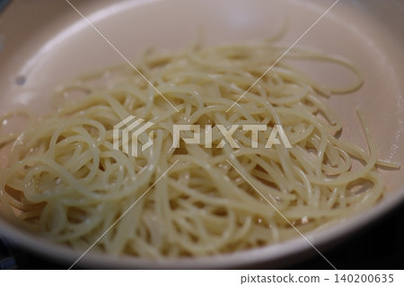 Cooked Pasta in White Bowl Cooked Pasta in White Bowl 140200635