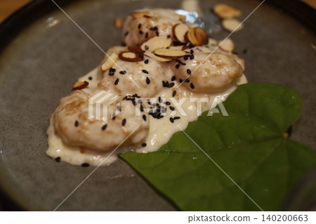 Gourmet Dish with Almonds and Sesame Seeds Gourmet Dish with Almonds and Sesame Seeds 140200663