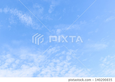 beautiful blue sky and white fluffy group of clouds with sunrise in the morning, natural background beautiful blue sky and white fluffy group of clouds with sunrise in the morning, natural background 140200835