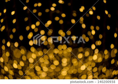 many bokeh from light bulb tubes on a street at night look like luxury golden starlight many bokeh from light bulb tubes on a street at night look like luxury golden starlight 140200938