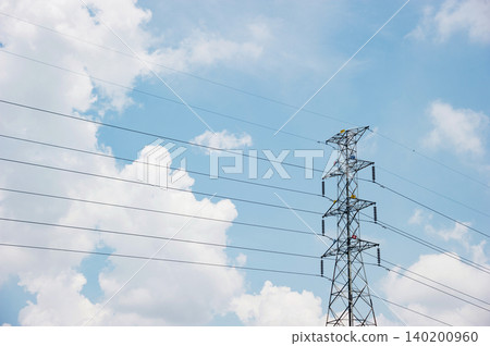 a big electric post with cloudy sky a big electric post with cloudy sky 140200960