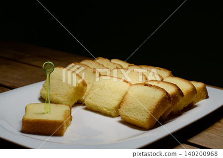 lot of soft sponge cake in white dish for party lot of soft sponge cake in white dish for party 140200968