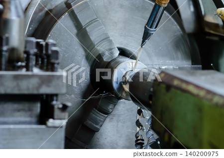 an industrial milling drilling machine is processed at the factory site an industrial milling drilling machine is processed at the factory site 140200975
