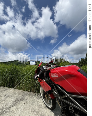 red motorcycle red motorcycle 140201721