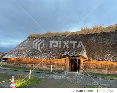 This is a reconstructed, illuminated large pit dwelling at the Sannai-Maruyama archaeological site in Aomori City. This is a reconstructed, illuminated large pit dwelling at the Sannai-Maruyama archaeological site in Aomori City. 140202090