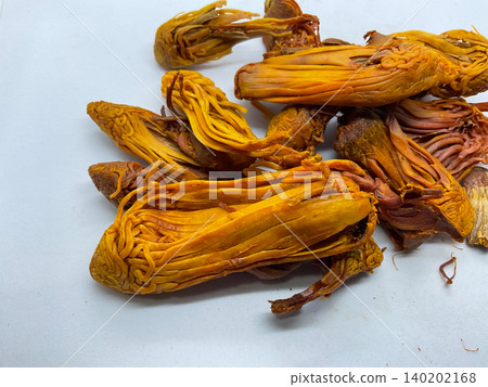 pile of dried Rampatri (Wild Mace) pieces isolated on a clean white background. pile of dried Rampatri (Wild Mace) pieces isolated on a clean white background. 140202168