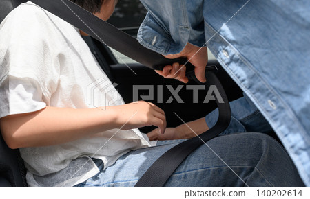Hands fastening seat belts Hands fastening seat belts 140202614