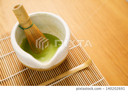 Japanese matcha tea ceremony equipment on wooden table Japanese matcha tea ceremony equipment on wooden table 140202691