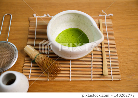 Japanese matcha tea ceremony equipment on wooden table Japanese matcha tea ceremony equipment on wooden table 140202772