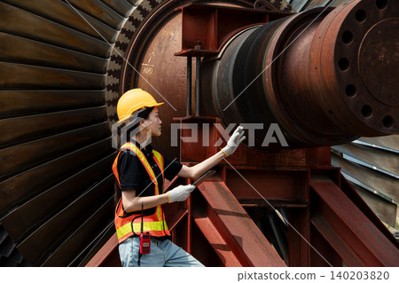 Professional engineer female working service power plant turbine fan blade electrical generator 140203820
