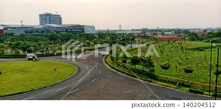 Modern city intersection with green park 140204512