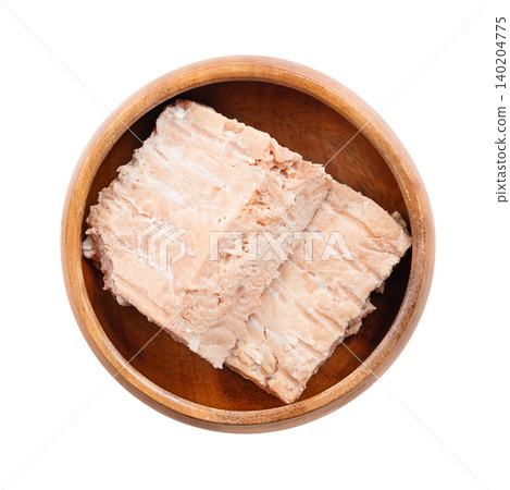 Pink salmon fillet pieces in a wooden bowl. Wild-caught, canned Pink salmon, Oncorhynchus gorbuscha, with pale pink flesh, low oil content, mild flavour, and firm texture. Isolated from above. Photo Pink salmon fillet pieces in a wooden bowl. Wild-caught, canned Pink salmon, Oncorhynchus gorbuscha, with pale pink flesh, low oil content, mild flavour, and firm texture. Isolated from above. Photo 140204775