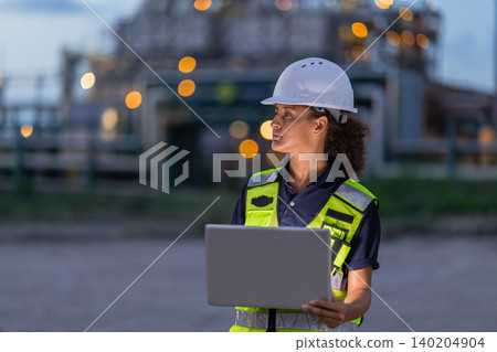 Professional Engineer work at offshore oil and gas refinery field survey petroleum industry plant. Professional Engineer work at offshore oil and gas refinery field survey petroleum industry plant. 140204904