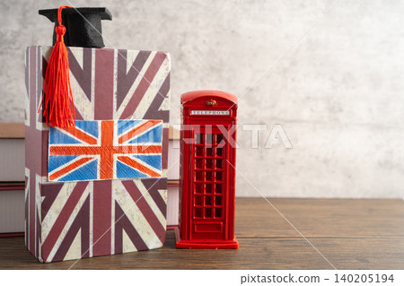 UK flag with graduate hat on english language book. 140205194
