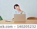 Women experiencing shoulder stiffness while working from home 140205232