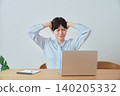 A woman is troubled by work-related problems. 140205332
