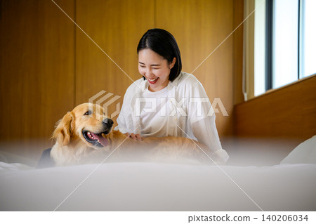 Women interacting with dogs Women interacting with dogs 140206034
