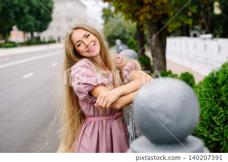 Elegant Smiling Woman In Urban Street Scene Elegant Smiling Woman In Urban Street Scene 140207391