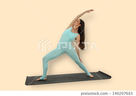 Yoga session features a woman stretching on a mat 140207683