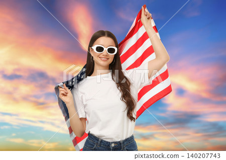 USA 250, Woman waves American flag joyfully. Patriotism and celebration concept USA 250, Woman waves American flag joyfully. Patriotism and celebration concept 140207743