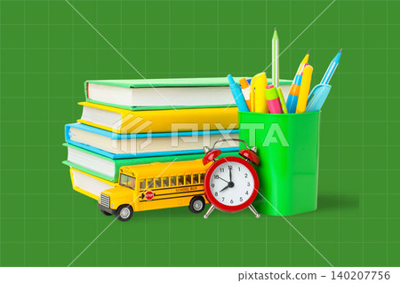 School supplies organized with clock showing start time School supplies organized with clock showing start time 140207756