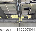 As technical documentation, a photograph of the back of the solar panel. 140207844